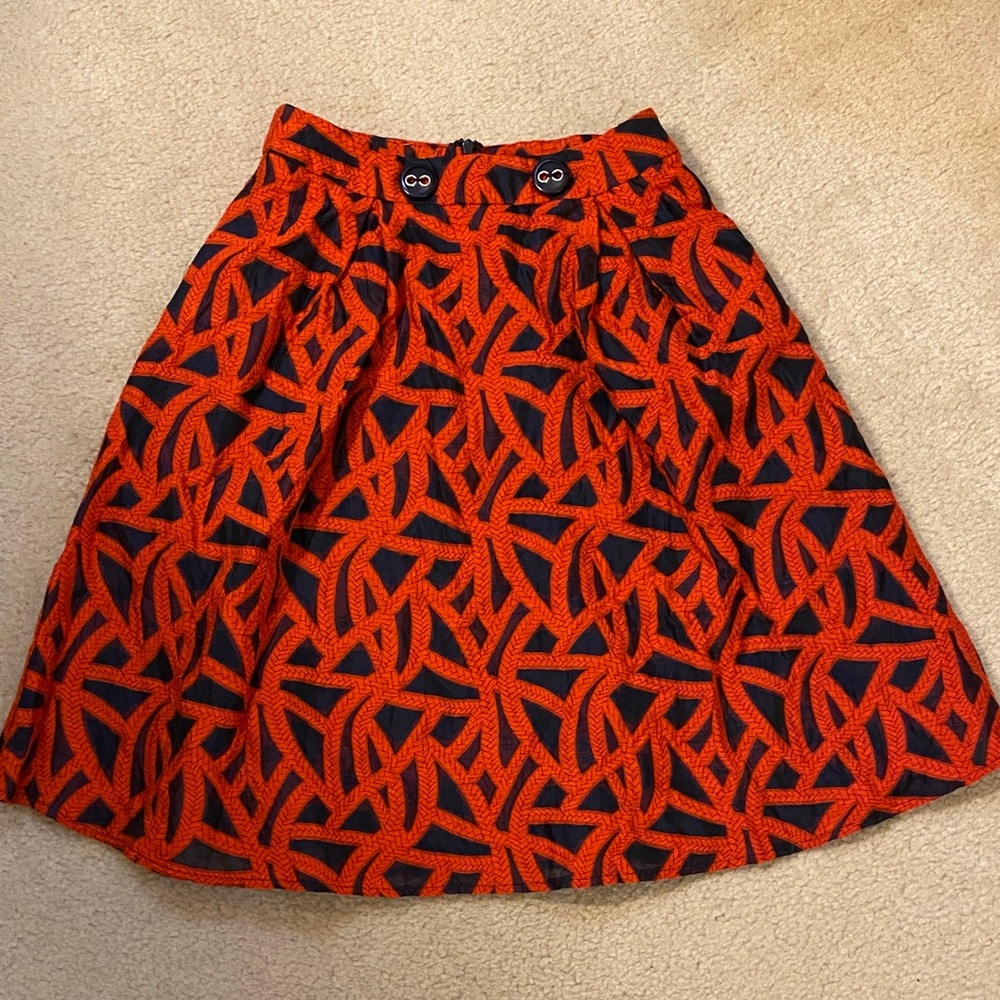 Patterned red and navy midi skirt by Eva Franco, size 4